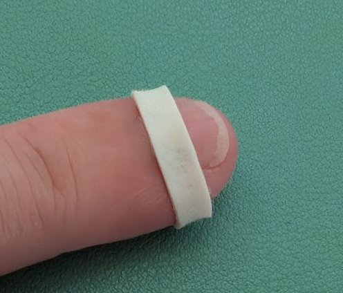 The last small rubberband I've got, the size of my pinky finger....
